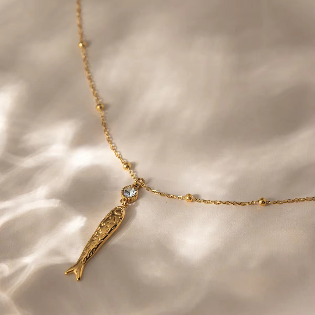 Fishy stone necklace